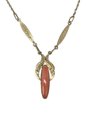 Gold necklace with an orange sun stone
