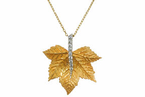 Gold necklace with zircons Maple leaf