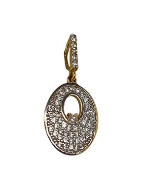 Gold oval pendant with zircons