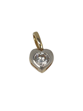 Gold pendant in the shape of a heart with zircon