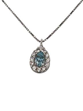 Gold pendant made of white gold with blue zircon