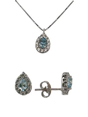 Gold set of white gold tears with blue zircons