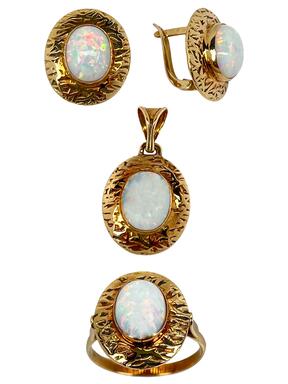 Gold set with engraving and Sky opals