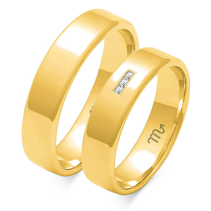 Klasikiniai vestuviniai žiedai su trimis akmenimis