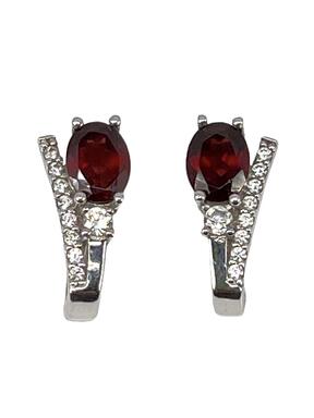 Luxurious white gold earrings with red and clear zircons
