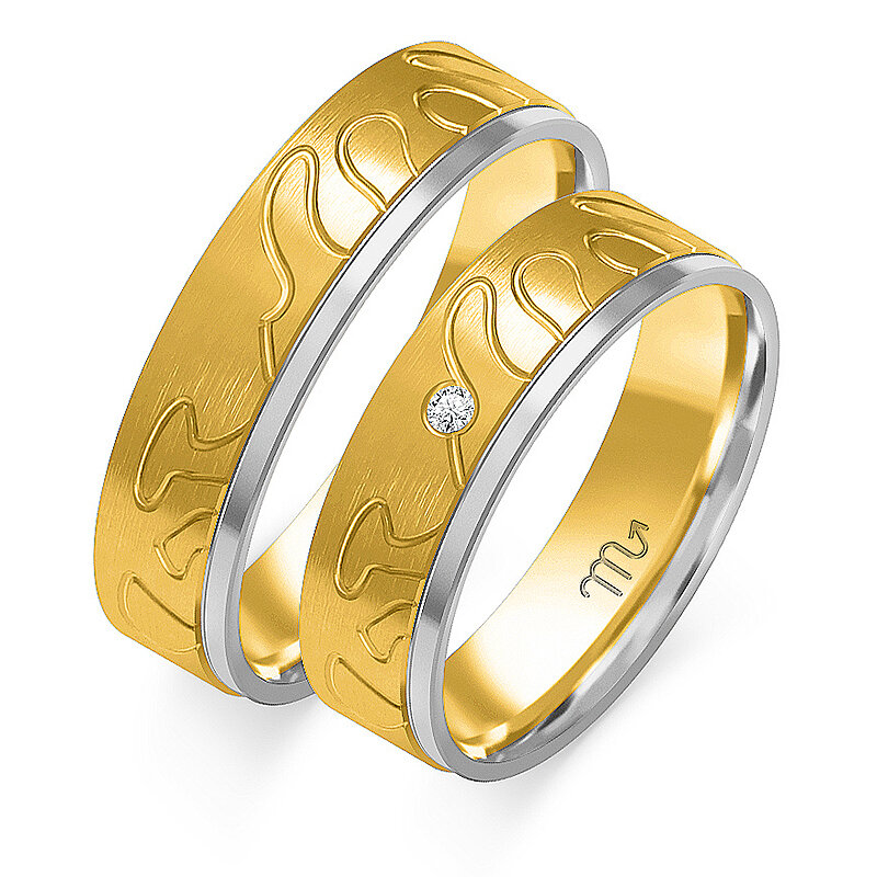 Matte wedding rings engraved with a stone