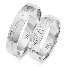 Multicolored shiny wedding rings with engraving and rhinestones