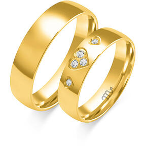 Shiny classic wedding rings with three hearts
