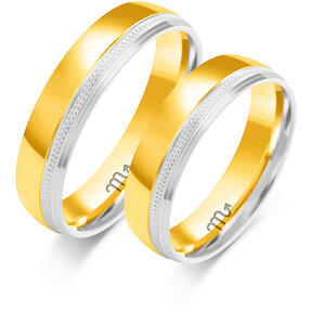 Shiny two-tone wedding rings with engraving