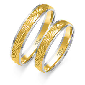 Shiny wedding rings with engraving