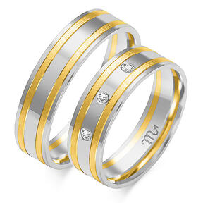 Shiny wedding rings with matte lines and rhinestones