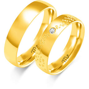 Shiny wedding rings with rings and stones