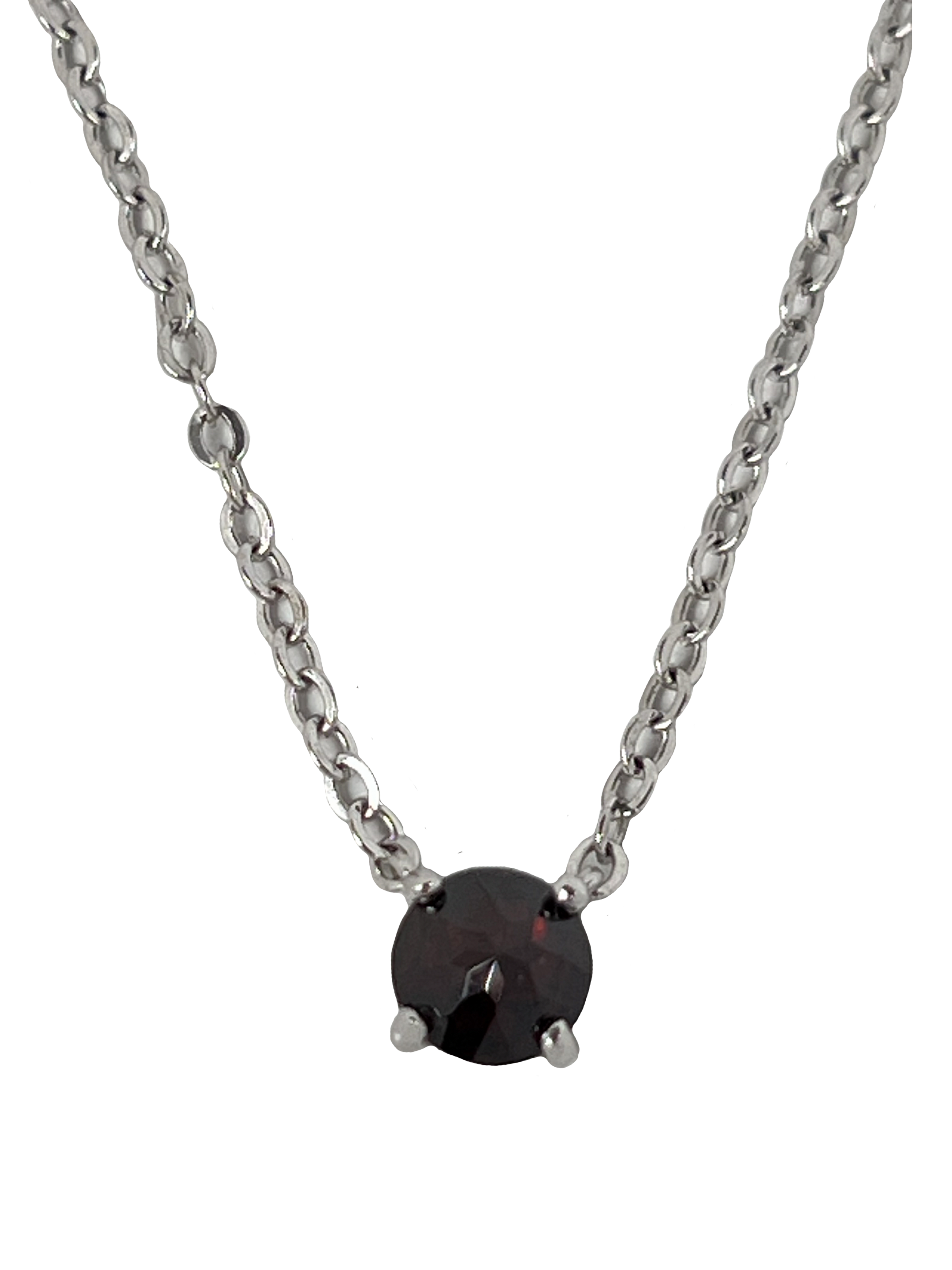 Silberne Halskette mit einem roten Stein