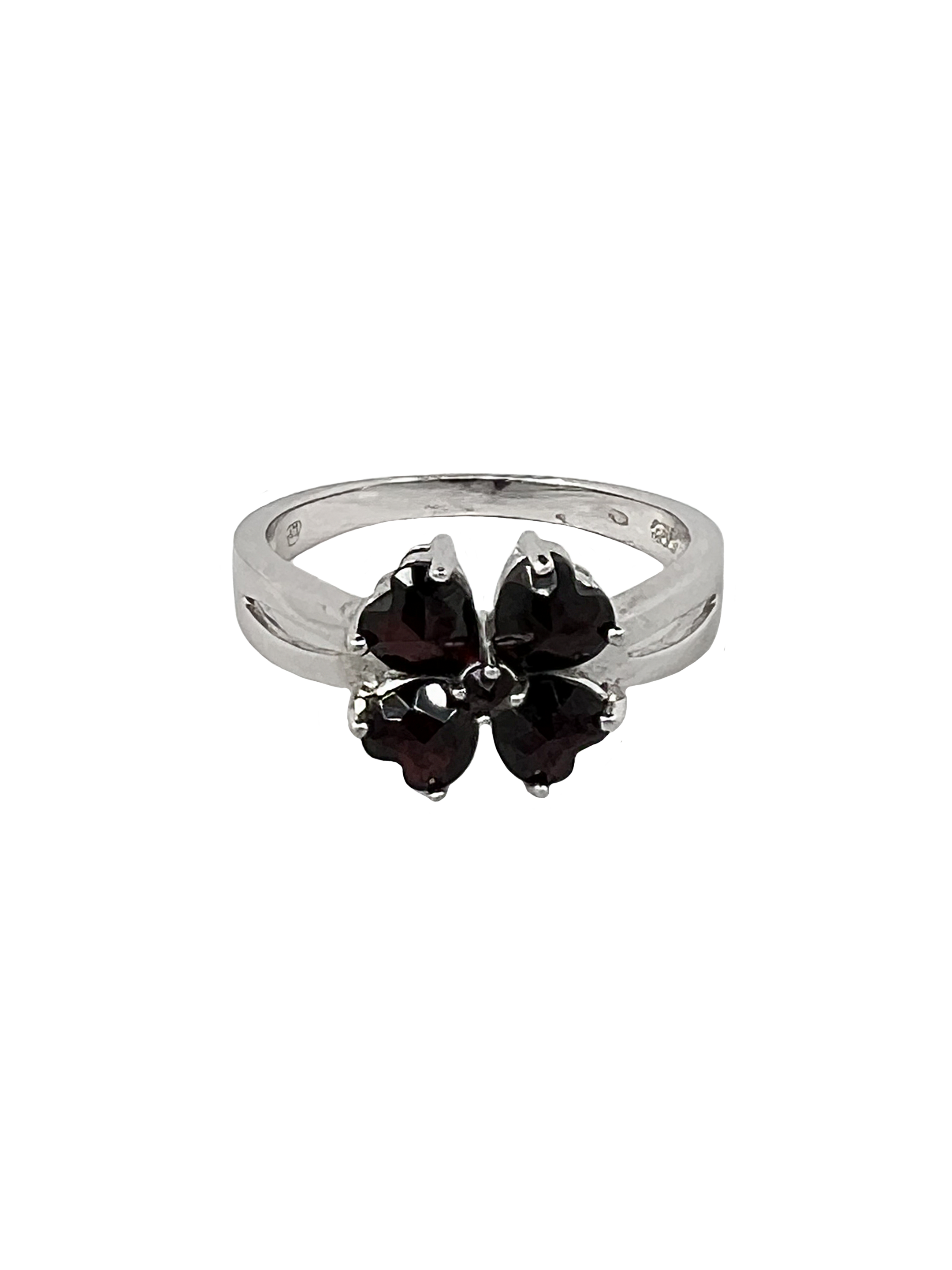 Silver flower ring with garnets