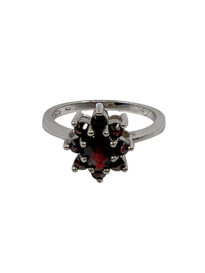Silver flower ring with garnets