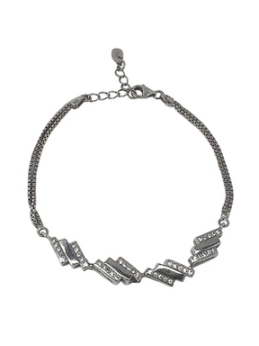 Silver patterned bracelet with crystals