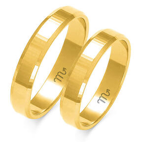 Two-tone wedding rings with a phased profile