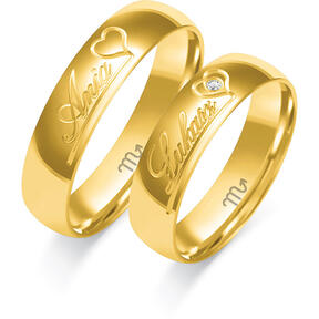 Wedding rings engraved with a heart and a stone