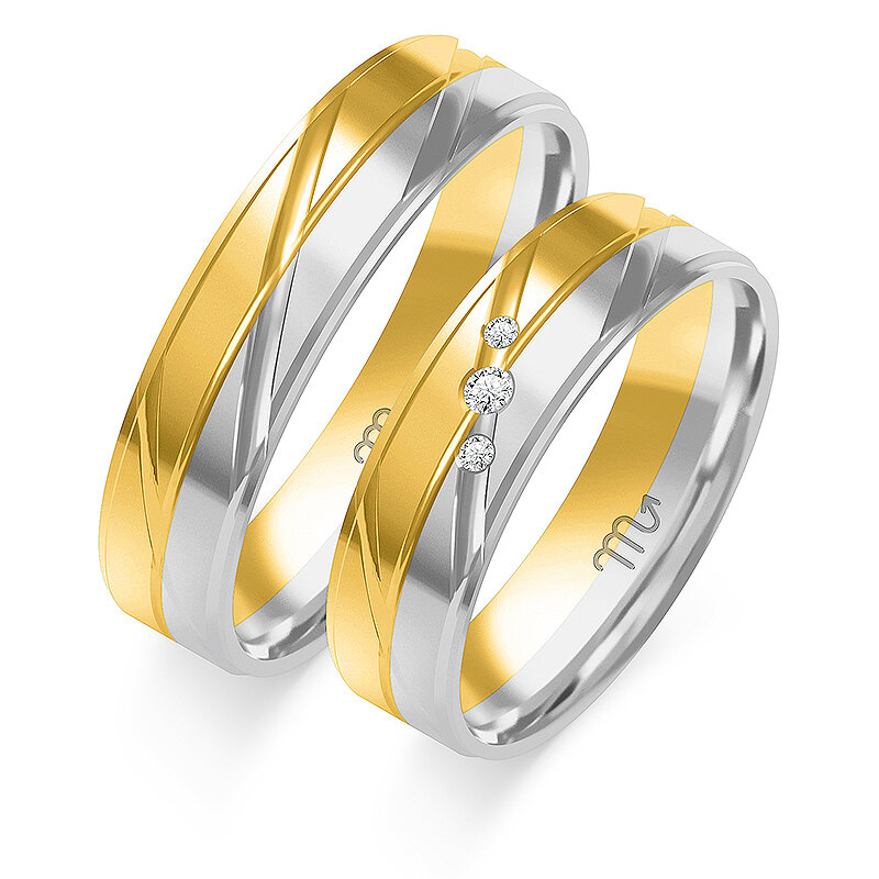 Wedding rings with decorative lines and rhinestones