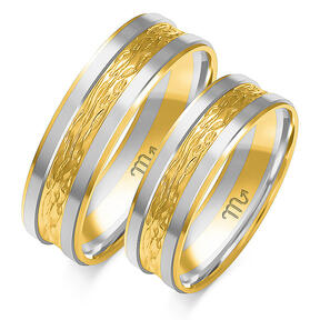 Wedding rings with engraving and phased profile