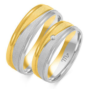 Wedding rings with shiny lines and stone