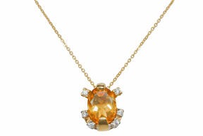 Zlatna ogrlica sa narančastim cirkonom